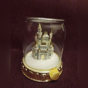 Disney castle lightup cloche candle holder by bath and body works.